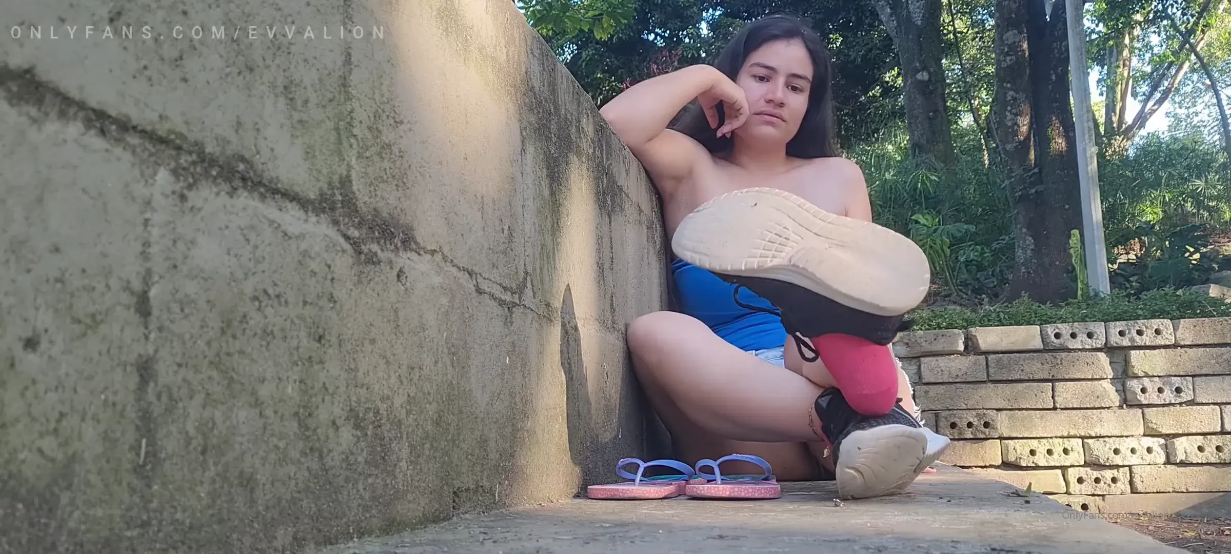 Flip flops dangling in the park 