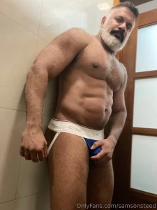 Some jock posing after a sweaty workout part 1