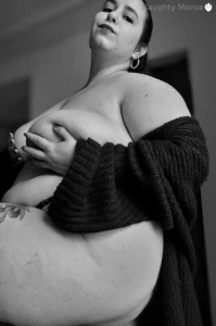 Black lace no bra and the oversized jacket barely holding it all