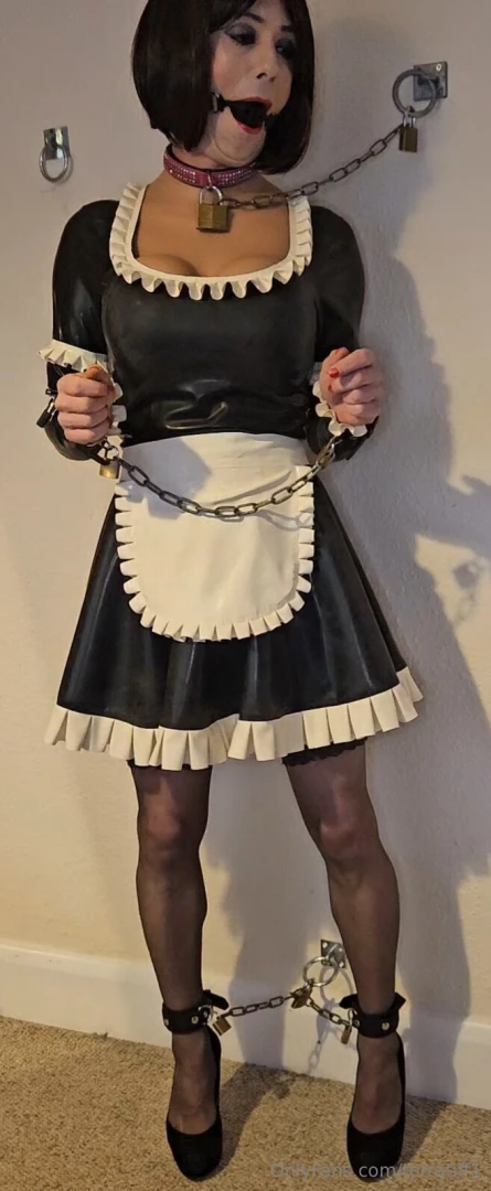 Gagged and chained to the wall in my maids dress 