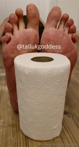 Comparing various items to my enormous size 18 bare soles
