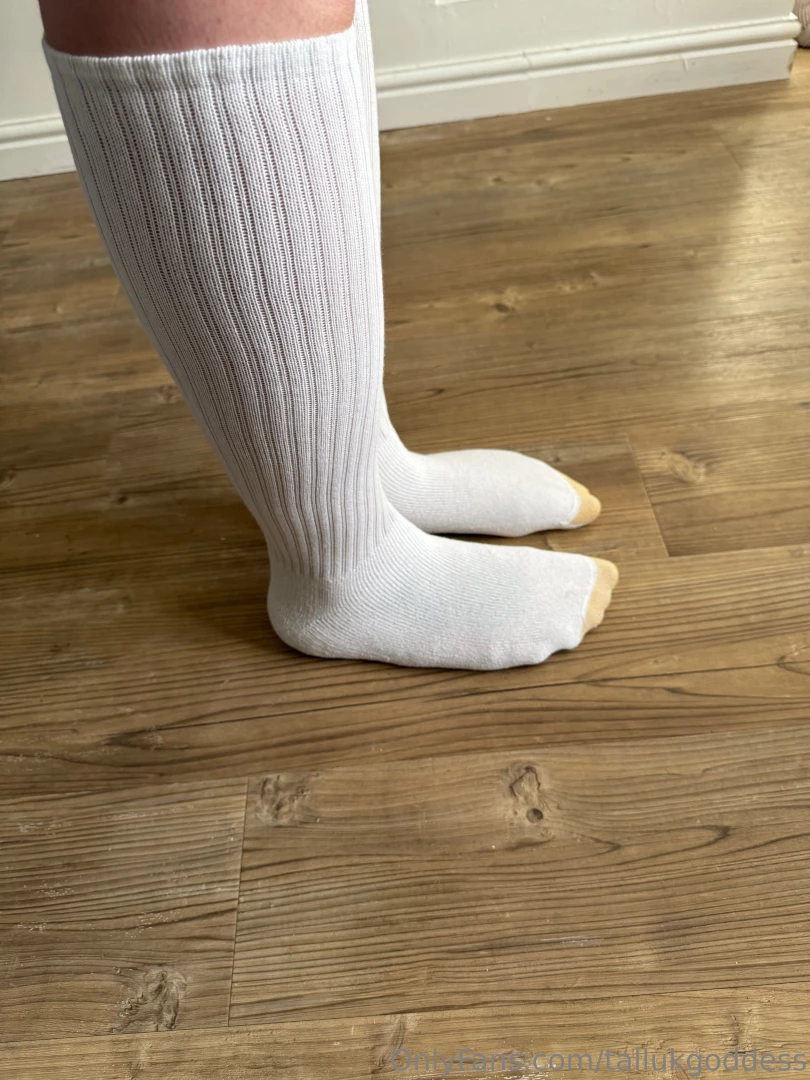 Huge size 18s in calf length socks measured against ruler in multiple part 2 