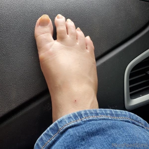 Propping my bare sweaty feet up on the dash i hope you don t mind it