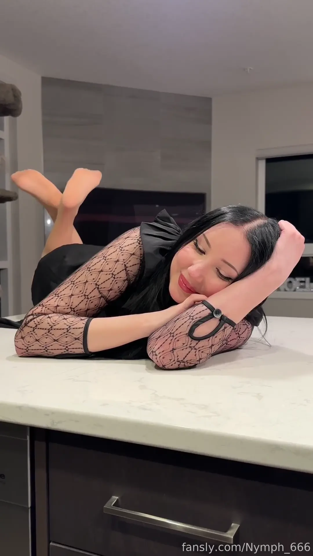 Flaunting my big nylon clad gothic e-girl feet in the pose 