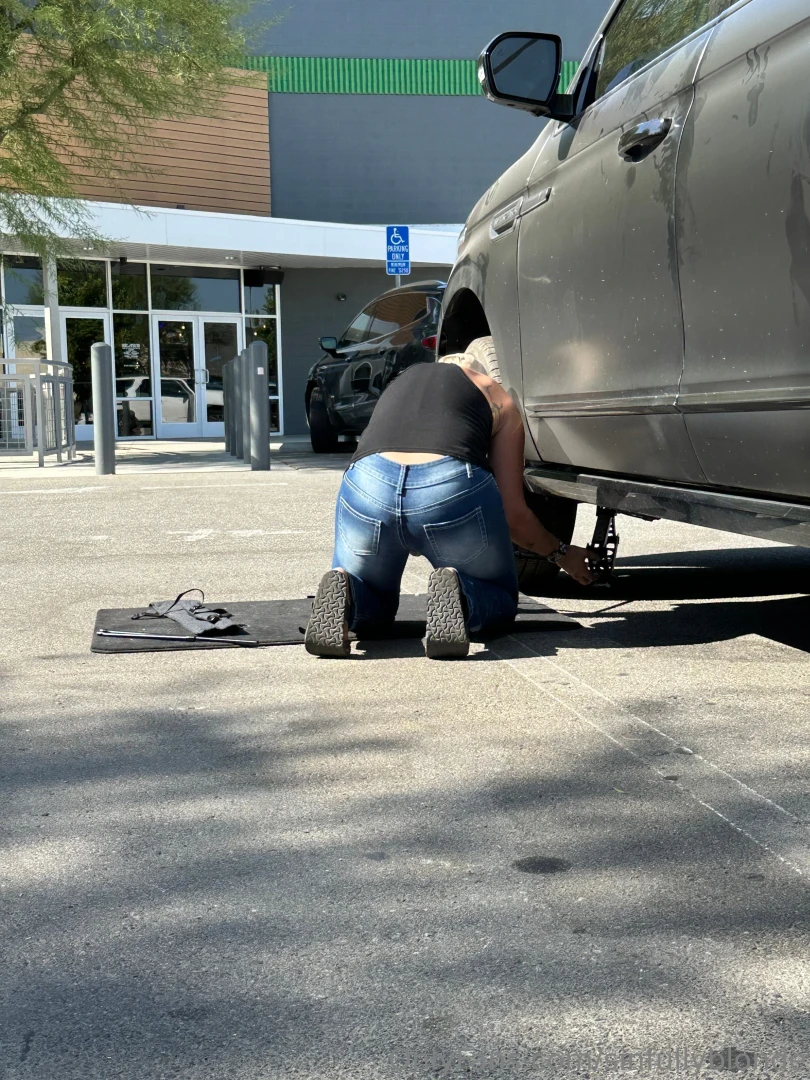 Out and about and got a flat good thing this girl knows how to change part 1 