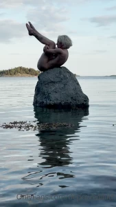 Naked on a rock one with it