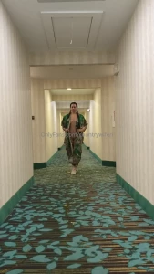 Confidently walkin the halls at the hotel