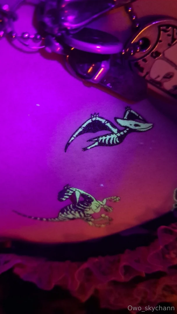 I stuck dinosaur glow in the dark stickers all over my chest glowing 