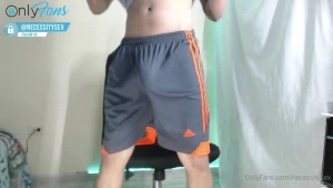 Freeballing in my football shorts and an epic self-suck wank