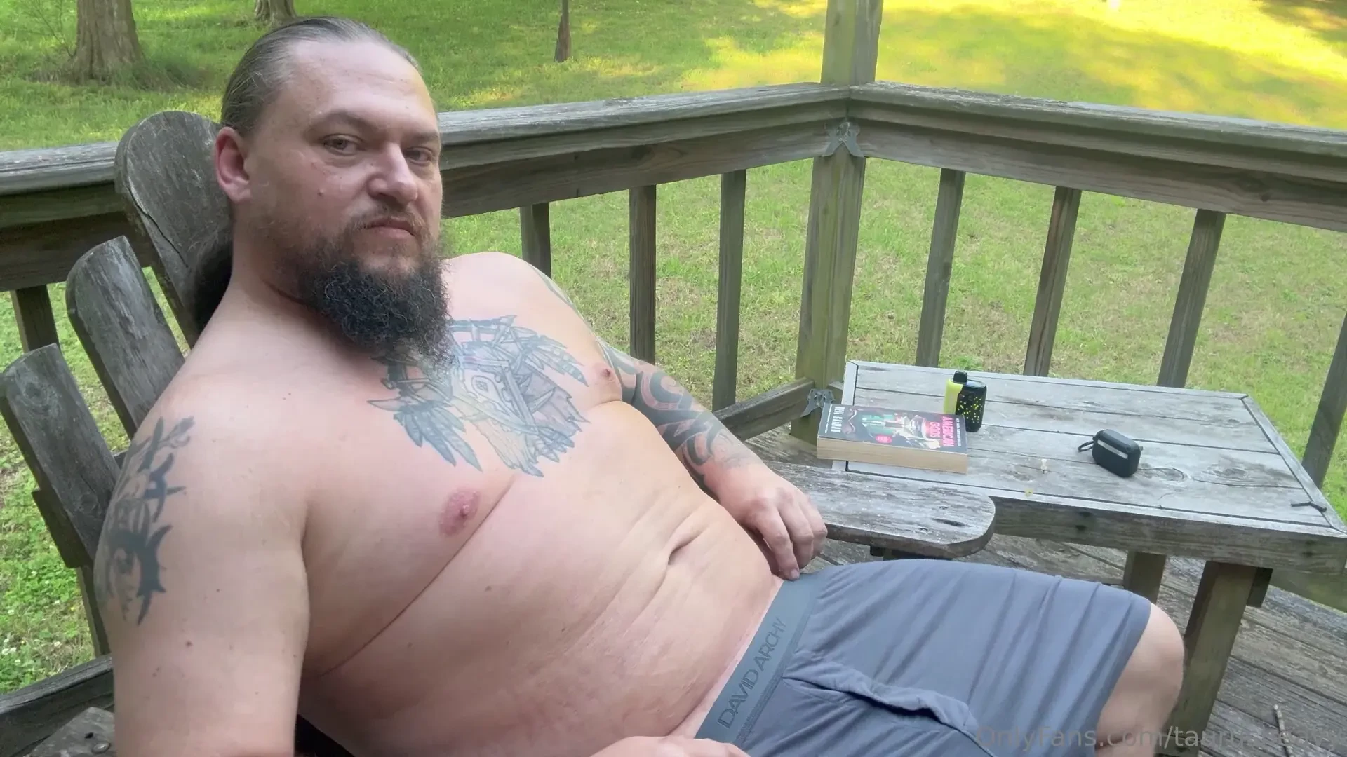 Enjoying a naked birthday reading on the deck 