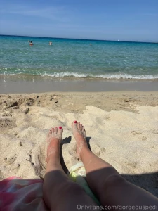 Warm sand on my feet and turquoise water in the background is part 1