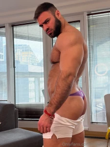 Side view shirt off shorts sliding down slow just enough to tease the