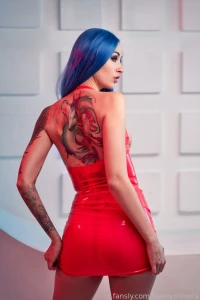 The blue hair is just a warning but the tattoo on your back for those