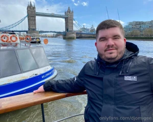 Causing on the river thames with tower bridge behind