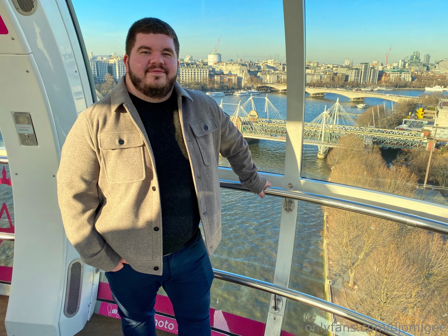 On the top of the london eye with the river thames stretching out 