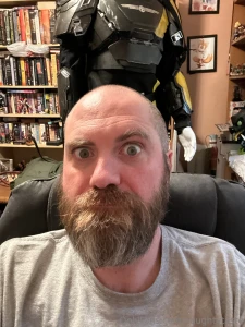 My beard is bushy should i trim it back down