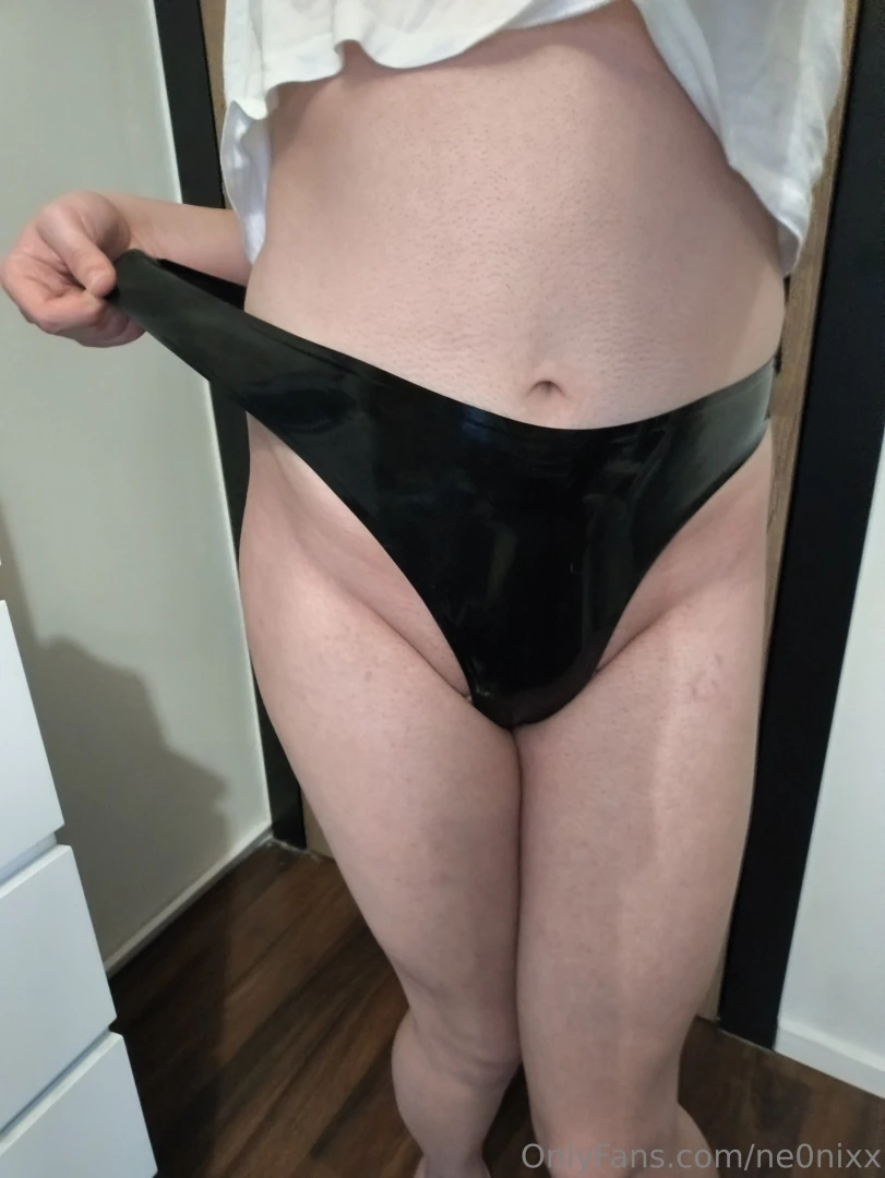 Shiny latex thongs 