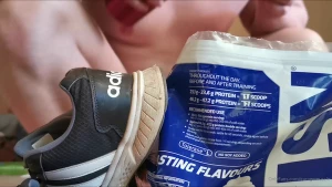 After a hard workout giant elijah wants to enjoy his protein shake but