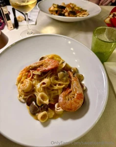 Dinner with a friend a glass of wine good food and gossip