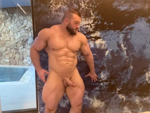 The sweat glistens the muscles cut the gaze tempts can you handle all