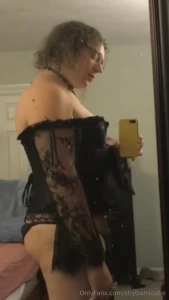 A video and 5 photos of me in a black corset and new black and red part 3