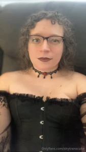 A video and 5 photos of me in a black corset and new black and red part 2