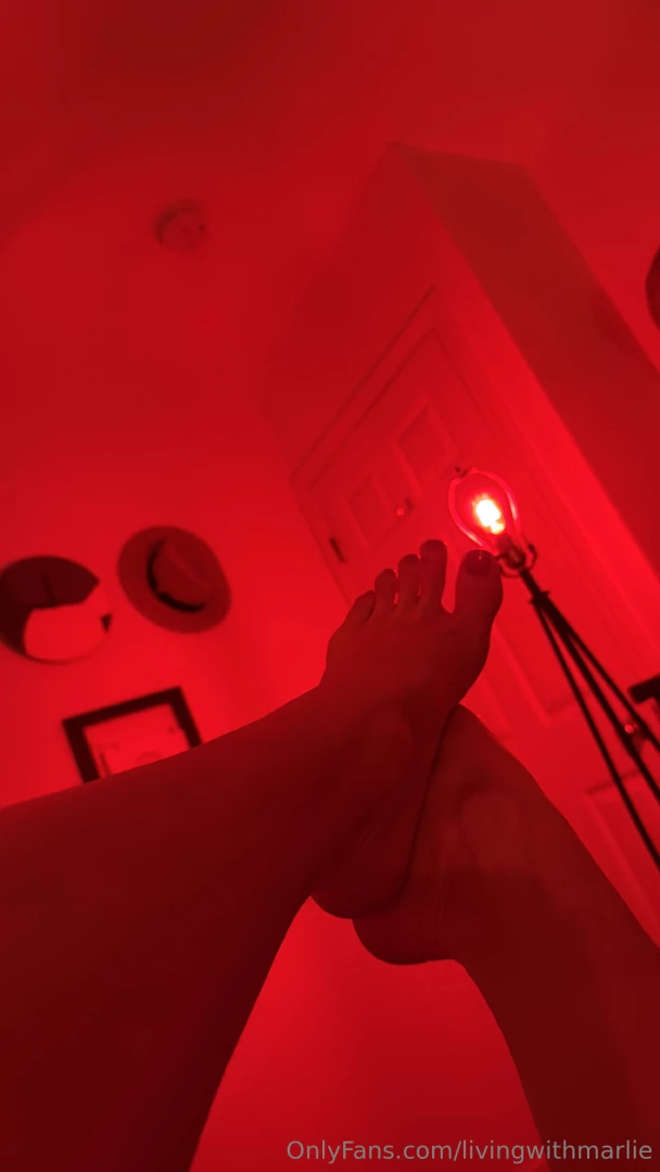 Red toes in red light 