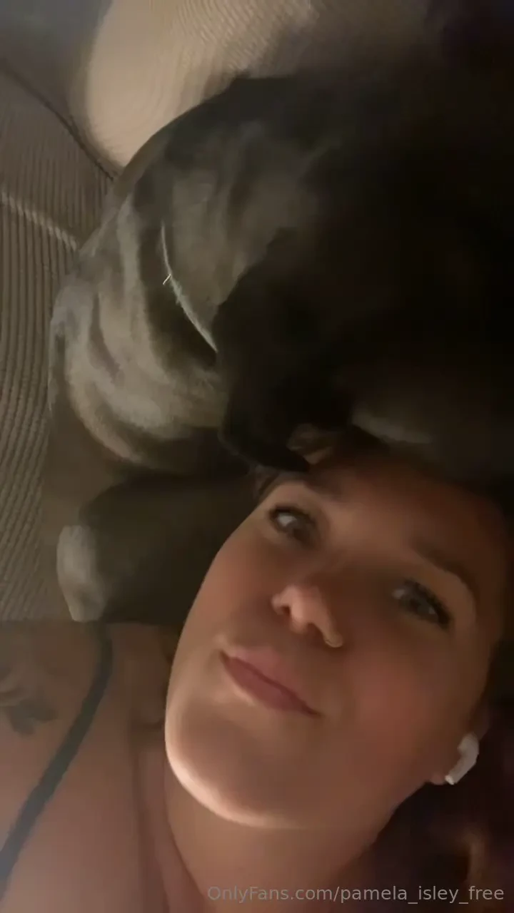 It s raining so i m chilling with the puppy what are you doing 