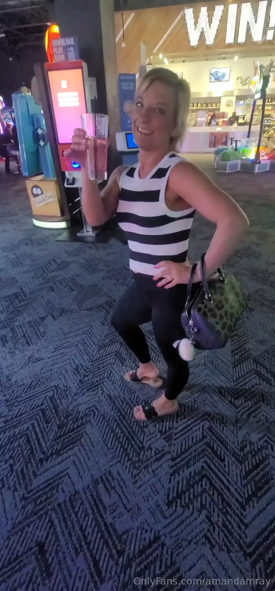 Out at dave amp busters have a good ole time winning on basketball 