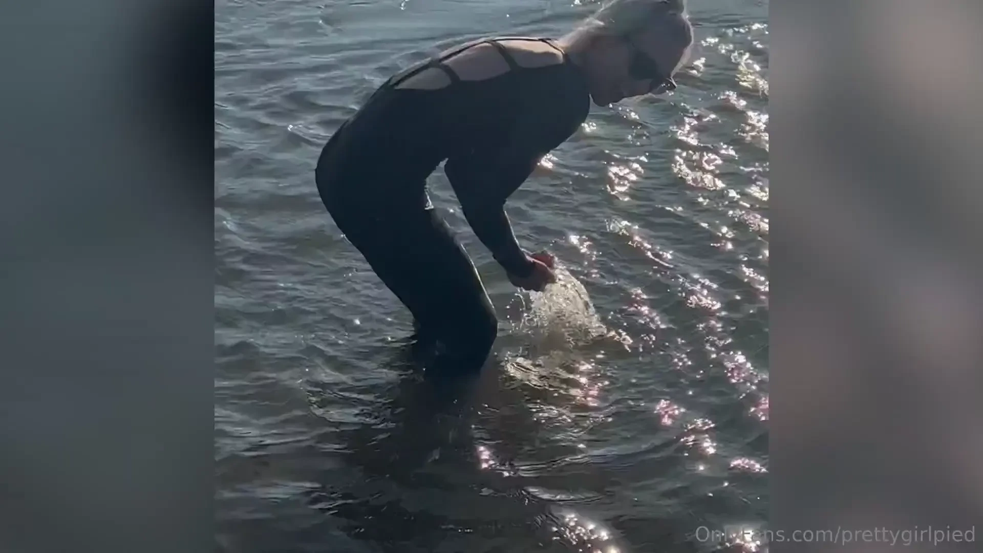 Check your messages to watch me get all sandy in my one piece 
