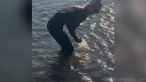 Check your messages to watch me get all sandy in my one piece