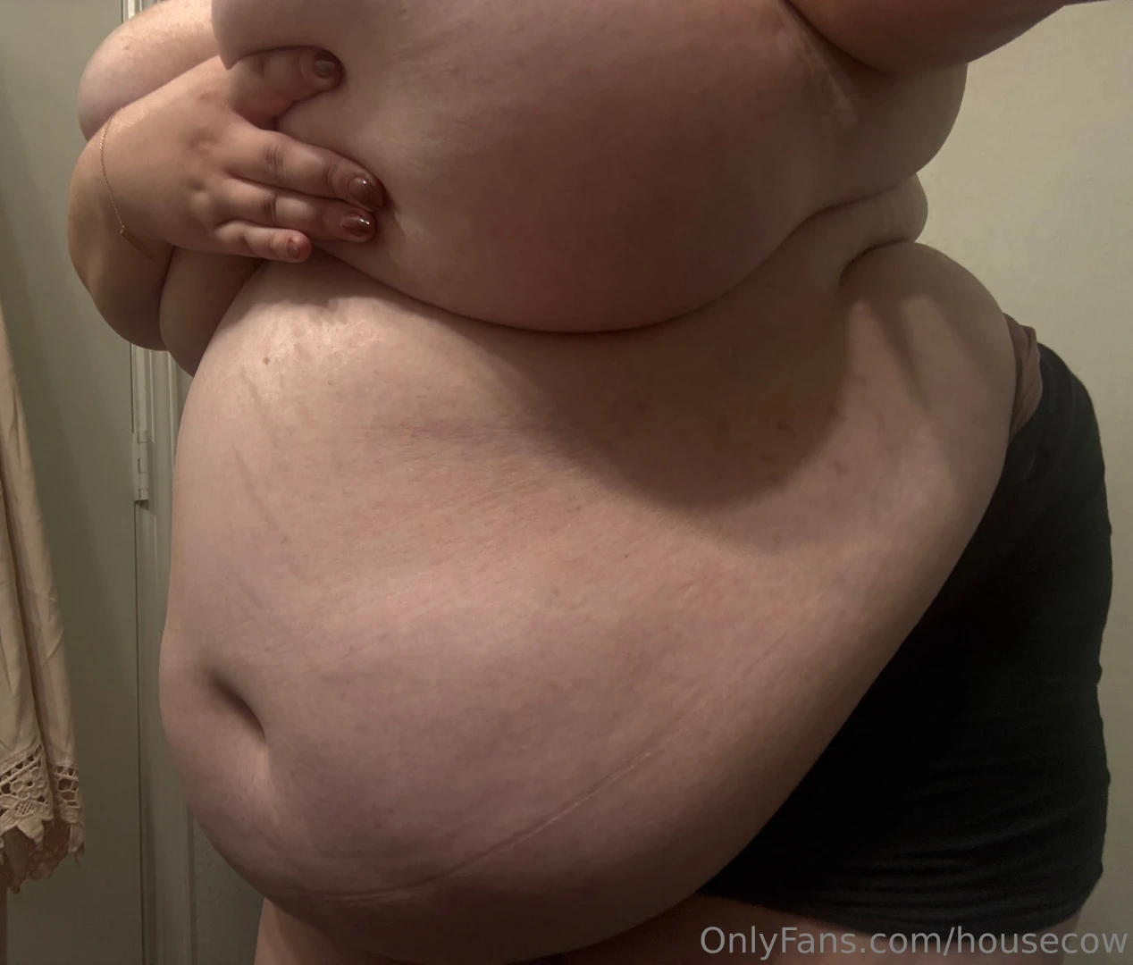 Desperately trying to fit all of myself in frame after the sushi place 