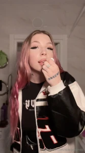 Shiny lips crisp eyeliner and a don t mess with me vibe the outfit is