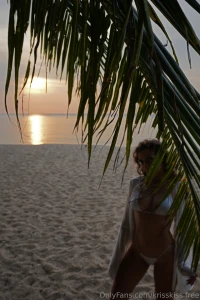 Golden sunsets soft sand and a little bit of mystery behind the palms