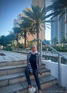 The palm trees rustled about something of their own the building