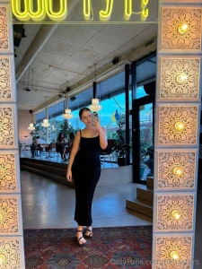 Something about a mirror selfie in a black dress makes everything feel