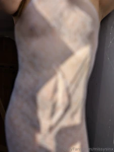 Sheer lace white dress and piercing