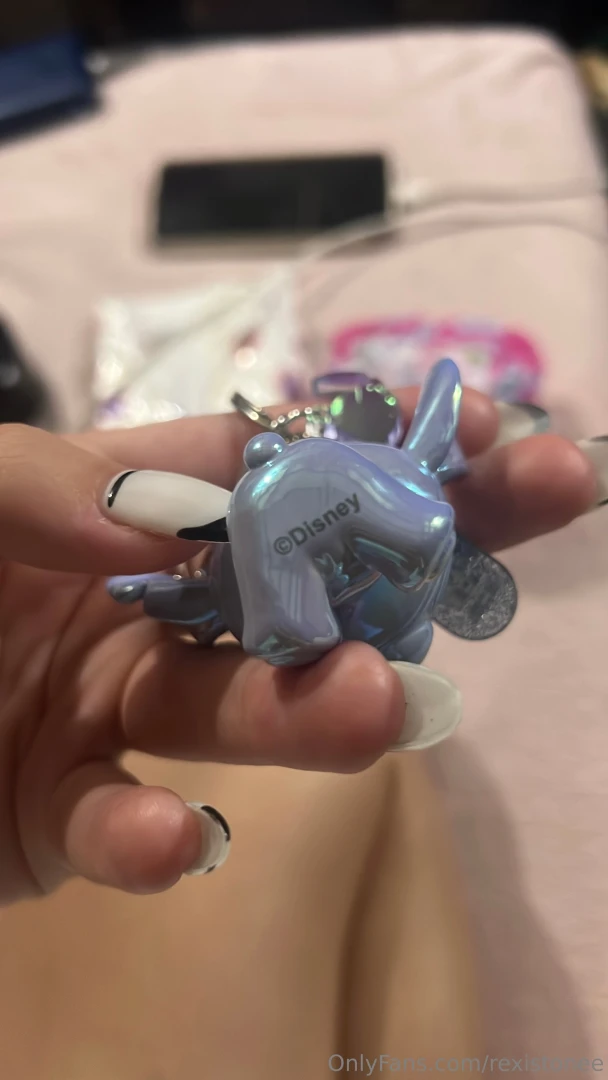Sweet like stitch sharp like these nails i might look cute holding him 