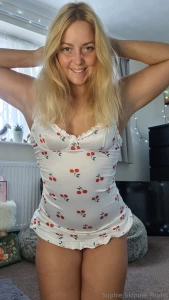 Watch me strip out of this cute cherry one piece a couple of sexy pics