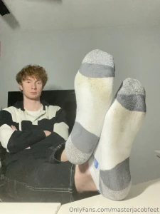 Kicking off my shoes to reveal these sweaty socks and soles get to