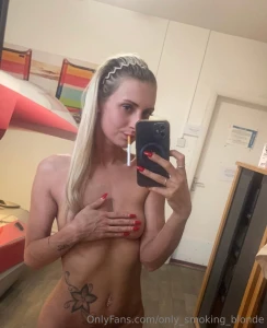 Quick sunbed stop cig at the ready to walk out with