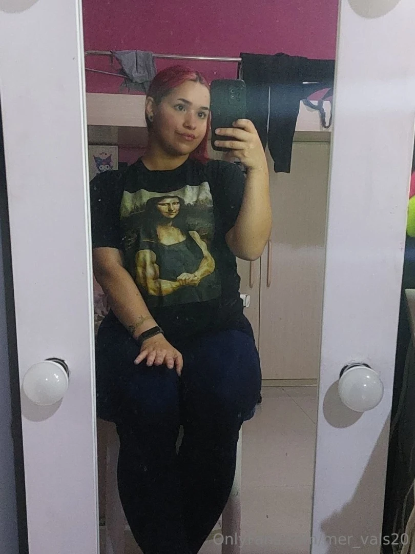 Sitting in a chair but not on santa s legs 