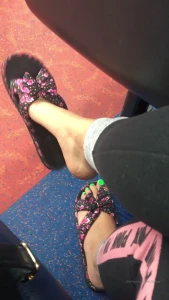 Dangling my flip flop on the bus