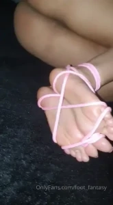 Pink rope pink toes my feet are helpless