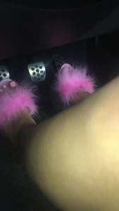 Pedal pumping in pink fluffy heels