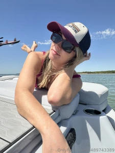 Kicking back on the boat sun on my skin and waves rocking us gently part 1