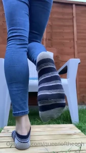 Taking off my sweaty socks and showing my tired soles and natural