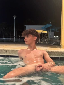 Playing with my big dick in our hot tub part 2