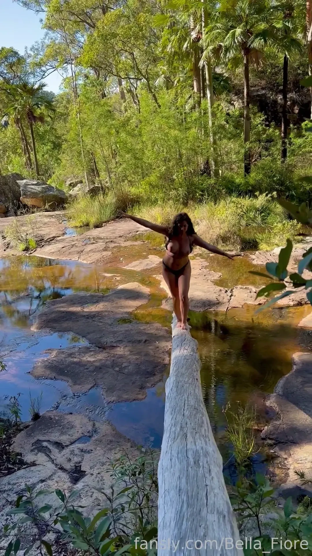 Trying to balance my big boobies while climbing this tree 