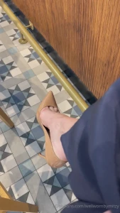 Dangling my nude louboutin pigalle follies as i sit at the airport bar